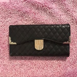 iPhone 7+ black quilted trifold wallet phone case